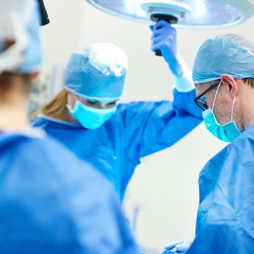 Surgeon and team in an operating room